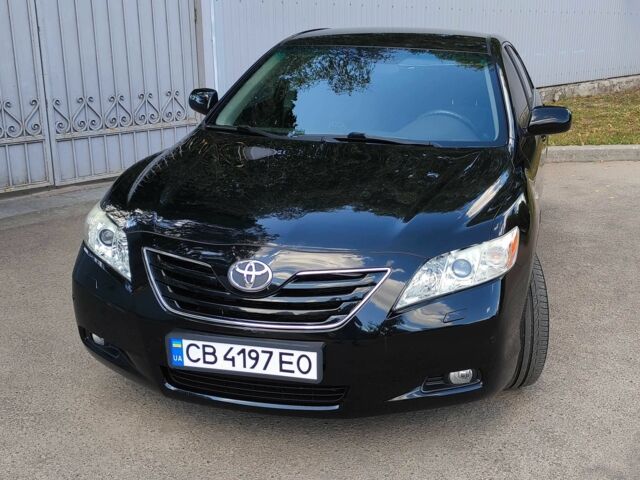 Черный Тойота Камри, объемом двигателя 2.4 л и пробегом 129 тыс. км за 10300 $, фото 1 на Automoto.ua