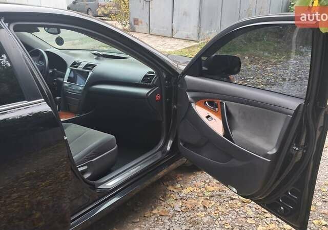 Черный Тойота Камри, объемом двигателя 2.36 л и пробегом 355 тыс. км за 7300 $, фото 10 на Automoto.ua