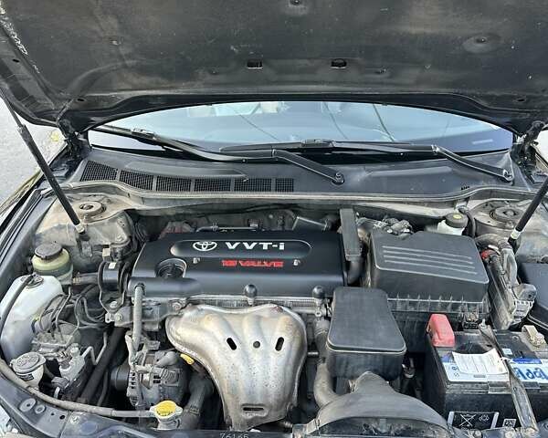 Черный Тойота Камри, объемом двигателя 2.36 л и пробегом 189 тыс. км за 12000 $, фото 10 на Automoto.ua