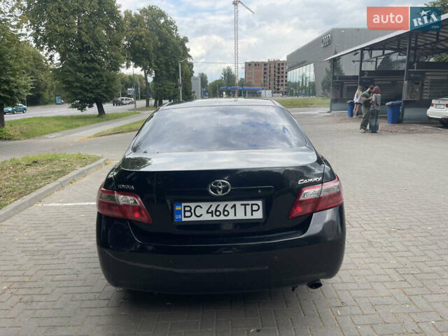 Чорний Тойота Камрі, об'ємом двигуна 2.4 л та пробігом 230 тис. км за 8499 $, фото 4 на Automoto.ua