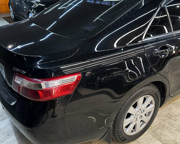 Черный Тойота Камри, объемом двигателя 2.36 л и пробегом 197 тыс. км за 9500 $, фото 9 на Automoto.ua