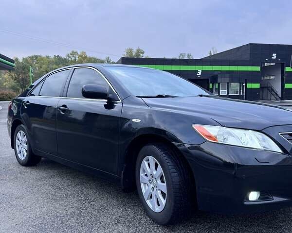 Черный Тойота Камри, объемом двигателя 2.4 л и пробегом 240 тыс. км за 8700 $, фото 1 на Automoto.ua