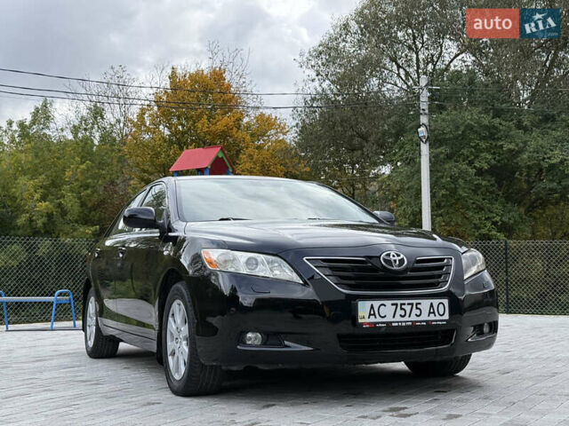 Черный Тойота Камри, объемом двигателя 3.5 л и пробегом 246 тыс. км за 11000 $, фото 1 на Automoto.ua