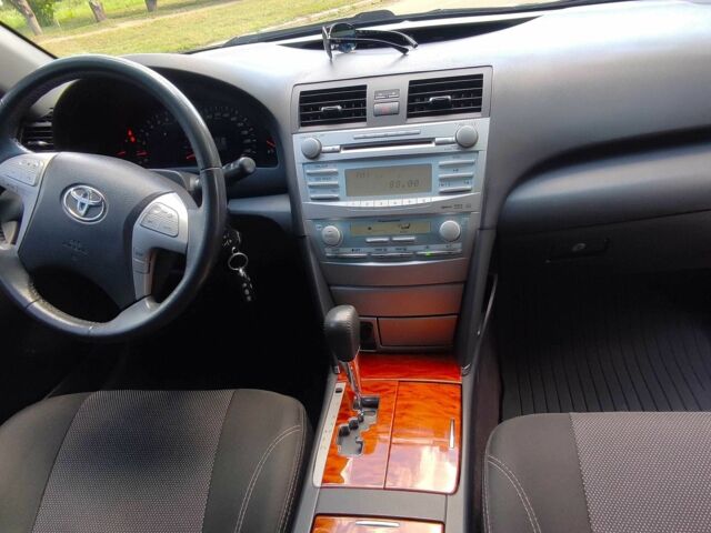 Черный Тойота Камри, объемом двигателя 2.4 л и пробегом 129 тыс. км за 10300 $, фото 3 на Automoto.ua