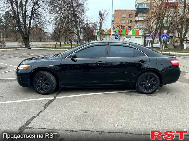 Черный Тойота Камри, объемом двигателя 35 л и пробегом 220 тыс. км за 11200 $, фото 2 на Automoto.ua