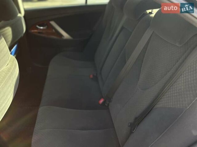 Черный Тойота Камри, объемом двигателя 2.4 л и пробегом 244 тыс. км за 8700 $, фото 22 на Automoto.ua