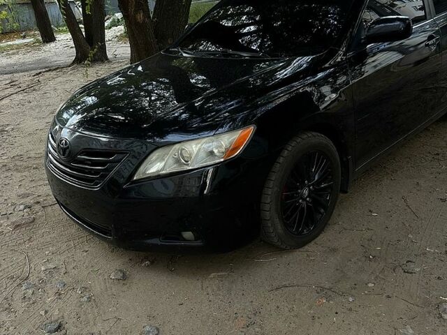 Черный Тойота Камри, объемом двигателя 2.4 л и пробегом 330 тыс. км за 8500 $, фото 2 на Automoto.ua