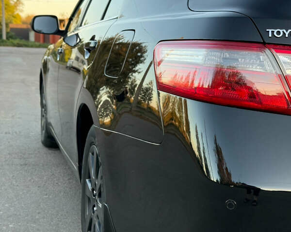 Чорний Тойота Камрі, об'ємом двигуна 3.46 л та пробігом 225 тис. км за 10300 $, фото 56 на Automoto.ua