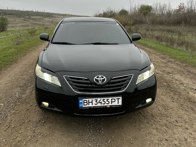 Черный Тойота Камри, объемом двигателя 2.4 л и пробегом 212 тыс. км за 8000 $, фото 1 на Automoto.ua