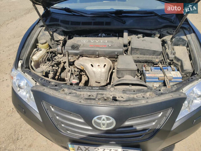 Черный Тойота Камри, объемом двигателя 2.4 л и пробегом 267 тыс. км за 8200 $, фото 20 на Automoto.ua