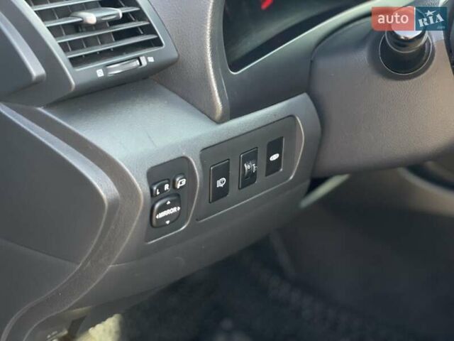 Черный Тойота Камри, объемом двигателя 2.4 л и пробегом 244 тыс. км за 8700 $, фото 16 на Automoto.ua