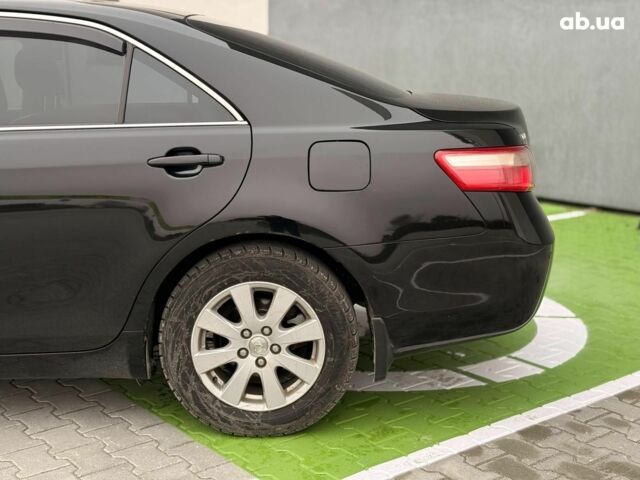 Чорний Тойота Камрі, об'ємом двигуна 2.4 л та пробігом 224 тис. км за 7990 $, фото 6 на Automoto.ua