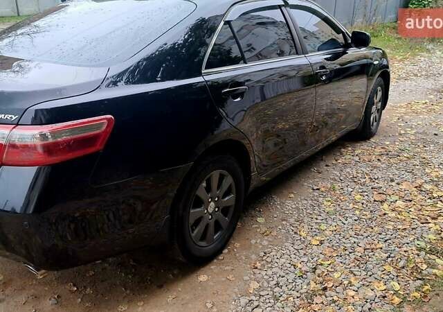 Черный Тойота Камри, объемом двигателя 2.36 л и пробегом 355 тыс. км за 7300 $, фото 2 на Automoto.ua