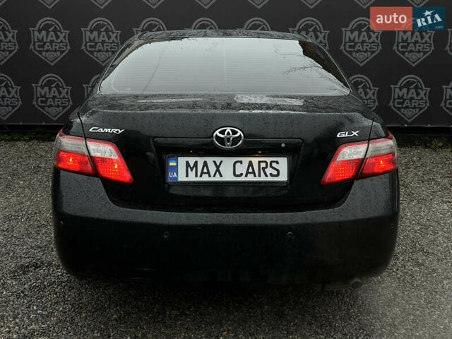 Черный Тойота Камри, объемом двигателя 2.4 л и пробегом 208 тыс. км за 7900 $, фото 5 на Automoto.ua