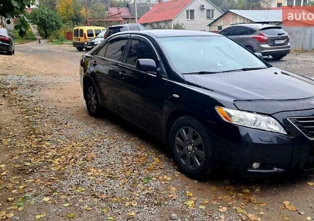Черный Тойота Камри, объемом двигателя 2.36 л и пробегом 355 тыс. км за 7300 $, фото 8 на Automoto.ua