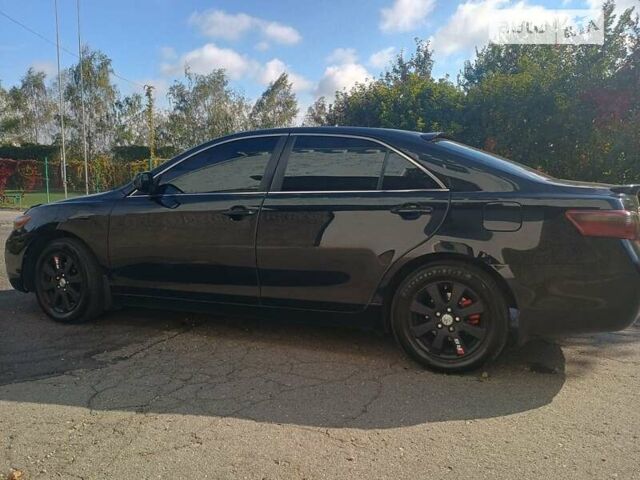 Чорний Тойота Камрі, об'ємом двигуна 2.36 л та пробігом 270 тис. км за 8800 $, фото 12 на Automoto.ua