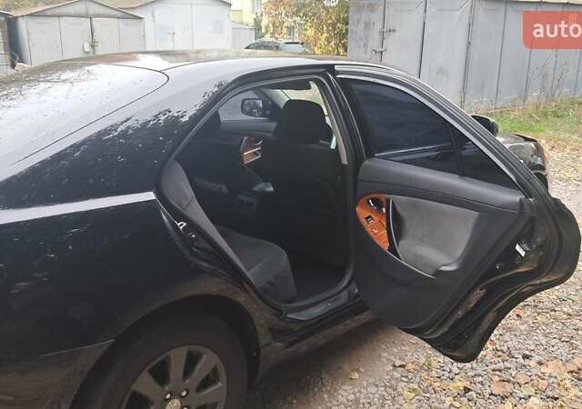 Черный Тойота Камри, объемом двигателя 2.36 л и пробегом 355 тыс. км за 7300 $, фото 11 на Automoto.ua