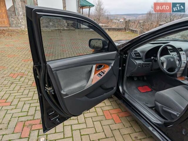 Черный Тойота Камри, объемом двигателя 2.4 л и пробегом 238 тыс. км за 7699 $, фото 30 на Automoto.ua