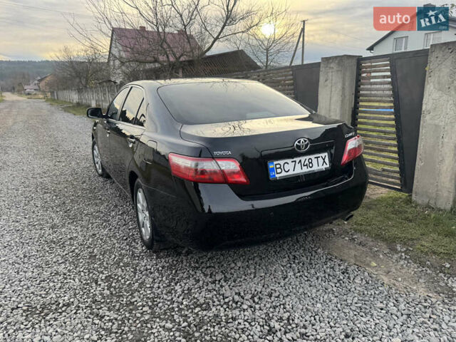 Чорний Тойота Камрі, об'ємом двигуна 2.4 л та пробігом 302 тис. км за 8400 $, фото 3 на Automoto.ua