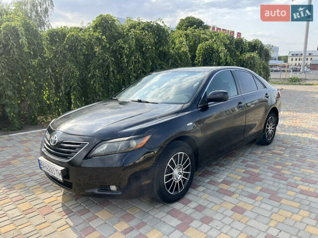 Черный Тойота Камри, объемом двигателя 2.36 л и пробегом 260 тыс. км за 7800 $, фото 5 на Automoto.ua