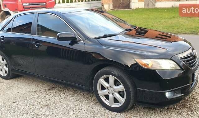 Черный Тойота Камри, объемом двигателя 2.4 л и пробегом 167 тыс. км за 8200 $, фото 8 на Automoto.ua