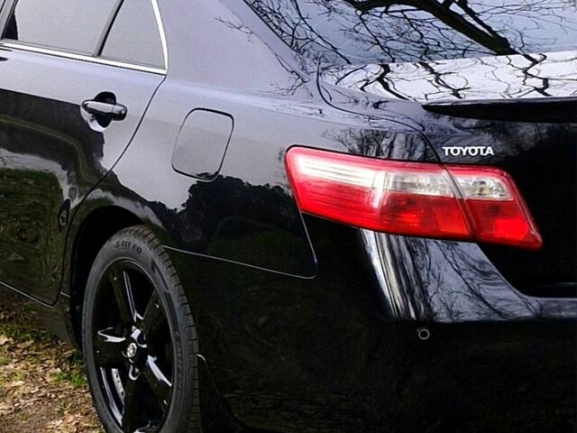 Черный Тойота Камри, объемом двигателя 3.5 л и пробегом 260 тыс. км за 7800 $, фото 1 на Automoto.ua