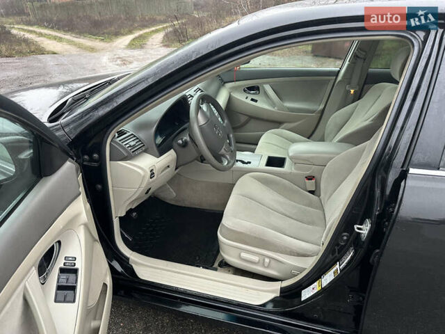 Черный Тойота Камри, объемом двигателя 2.4 л и пробегом 232 тыс. км за 6850 $, фото 9 на Automoto.ua