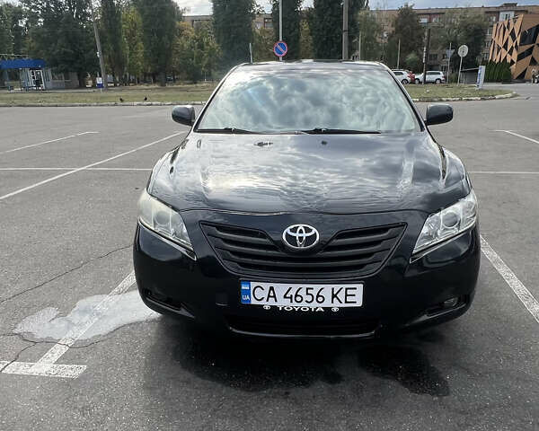 Черный Тойота Камри, объемом двигателя 2.36 л и пробегом 283 тыс. км за 8199 $, фото 2 на Automoto.ua