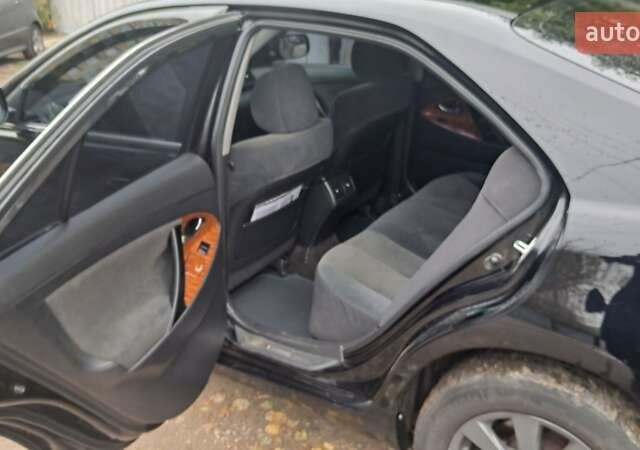 Черный Тойота Камри, объемом двигателя 2.36 л и пробегом 355 тыс. км за 7300 $, фото 15 на Automoto.ua