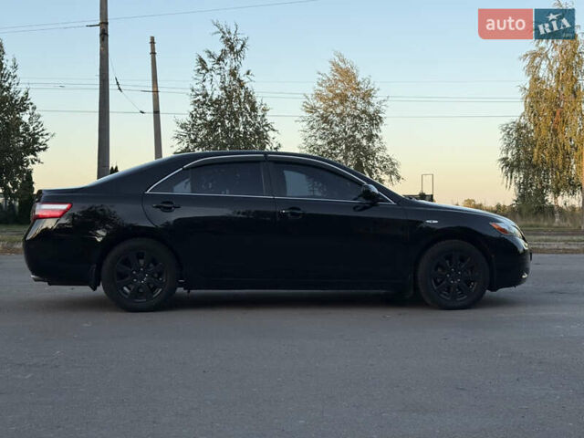Чорний Тойота Камрі, об'ємом двигуна 3.46 л та пробігом 225 тис. км за 10300 $, фото 9 на Automoto.ua