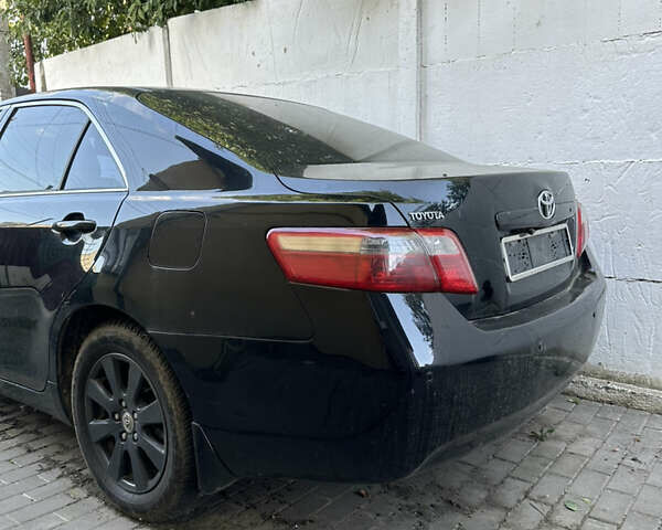 Чорний Тойота Камрі, об'ємом двигуна 2.36 л та пробігом 340 тис. км за 10500 $, фото 14 на Automoto.ua
