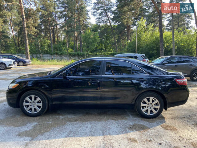 Черный Тойота Камри, объемом двигателя 2.4 л и пробегом 246 тыс. км за 9500 $, фото 7 на Automoto.ua