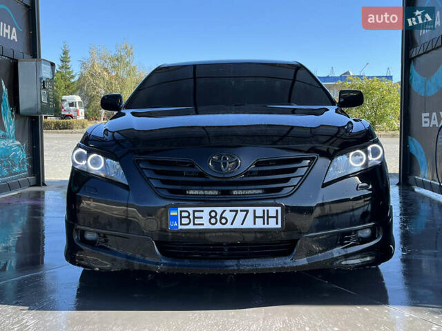 Черный Тойота Камри, объемом двигателя 3.5 л и пробегом 377 тыс. км за 10200 $, фото 19 на Automoto.ua