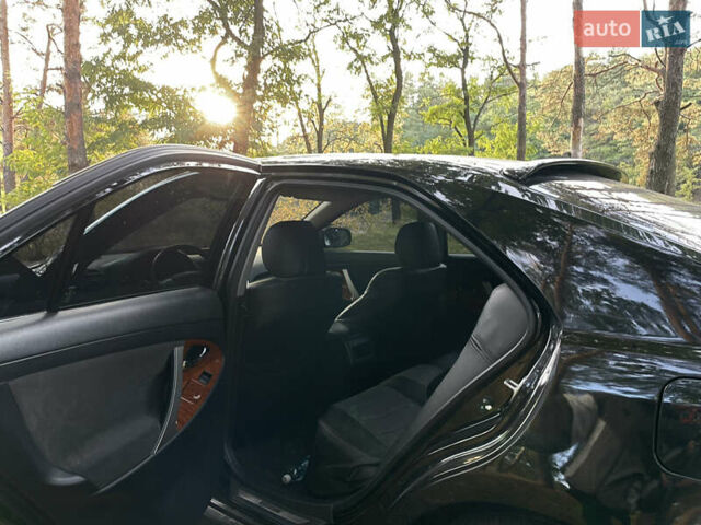 Черный Тойота Камри, объемом двигателя 2.36 л и пробегом 164 тыс. км за 8900 $, фото 13 на Automoto.ua