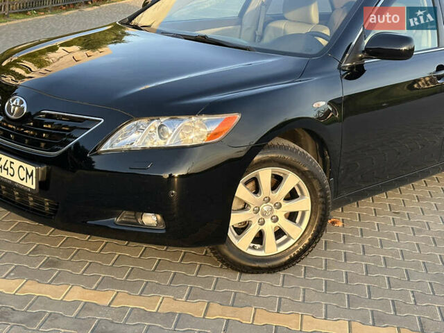 Черный Тойота Камри, объемом двигателя 2.4 л и пробегом 134 тыс. км за 11900 $, фото 7 на Automoto.ua