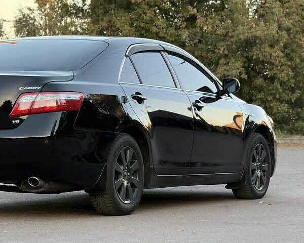 Чорний Тойота Камрі, об'ємом двигуна 3.46 л та пробігом 225 тис. км за 10300 $, фото 12 на Automoto.ua