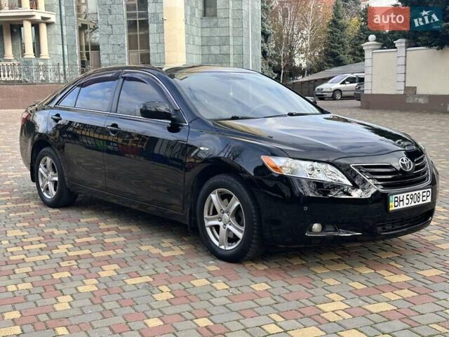 Черный Тойота Камри, объемом двигателя 2.36 л и пробегом 180 тыс. км за 8900 $, фото 1 на Automoto.ua