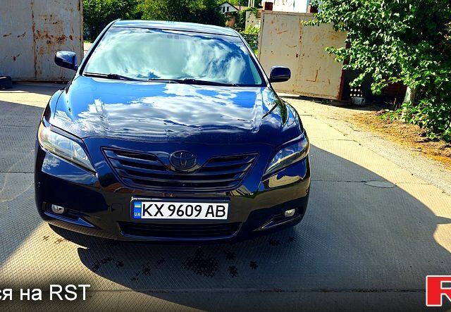 Черный Тойота Камри, объемом двигателя 2.4 л и пробегом 233 тыс. км за 8500 $, фото 2 на Automoto.ua