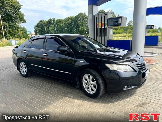 Черный Тойота Камри, объемом двигателя 2.4 л и пробегом 320 тыс. км за 8000 $, фото 3 на Automoto.ua