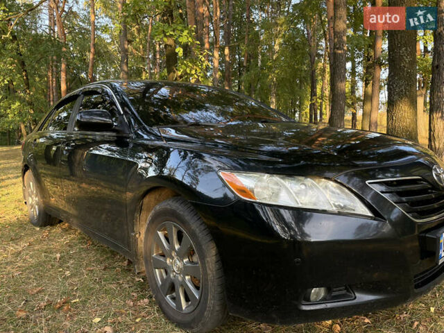 Черный Тойота Камри, объемом двигателя 2.36 л и пробегом 164 тыс. км за 8900 $, фото 10 на Automoto.ua