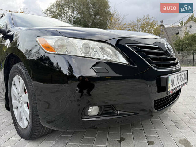 Черный Тойота Камри, объемом двигателя 3.5 л и пробегом 246 тыс. км за 11000 $, фото 24 на Automoto.ua