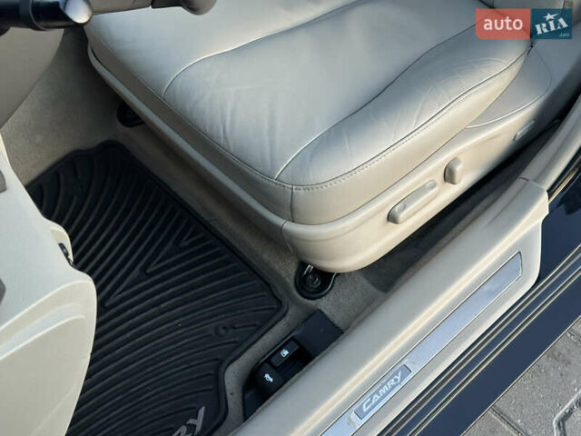 Черный Тойота Камри, объемом двигателя 2.4 л и пробегом 134 тыс. км за 11900 $, фото 72 на Automoto.ua