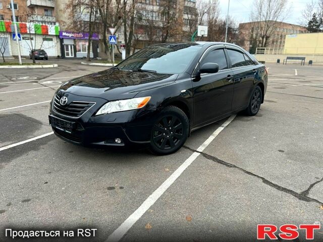 Черный Тойота Камри, объемом двигателя 35 л и пробегом 220 тыс. км за 11200 $, фото 1 на Automoto.ua
