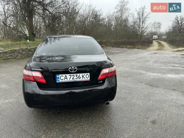 Черный Тойота Камри, объемом двигателя 2.4 л и пробегом 232 тыс. км за 6850 $, фото 5 на Automoto.ua