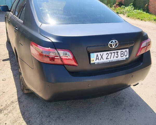Черный Тойота Камри, объемом двигателя 2.4 л и пробегом 267 тыс. км за 8200 $, фото 10 на Automoto.ua