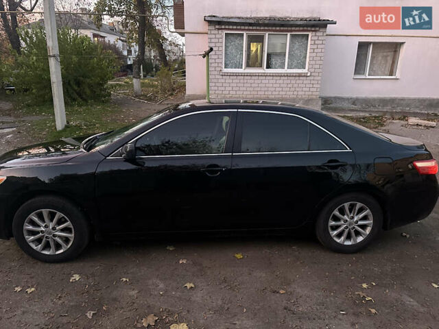 Чорний Тойота Камрі, об'ємом двигуна 2.36 л та пробігом 249 тис. км за 7000 $, фото 4 на Automoto.ua
