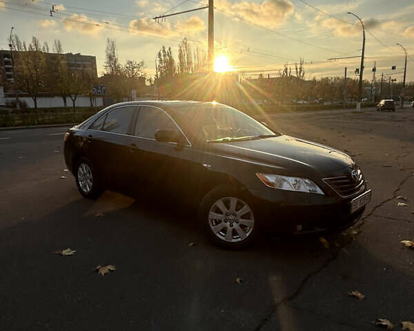 Черный Тойота Камри, объемом двигателя 2.4 л и пробегом 263 тыс. км за 8500 $, фото 8 на Automoto.ua