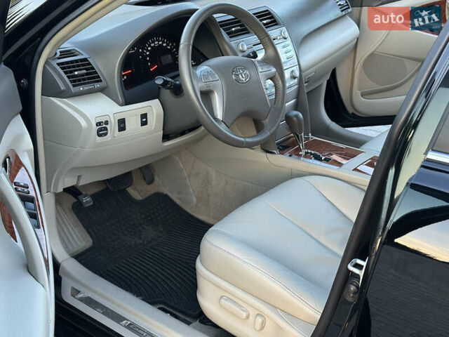 Черный Тойота Камри, объемом двигателя 2.4 л и пробегом 134 тыс. км за 11900 $, фото 68 на Automoto.ua