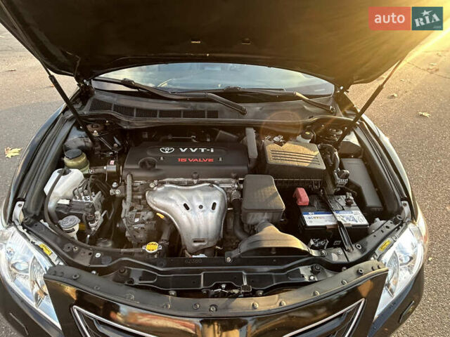 Черный Тойота Камри, объемом двигателя 2.4 л и пробегом 263 тыс. км за 8500 $, фото 6 на Automoto.ua