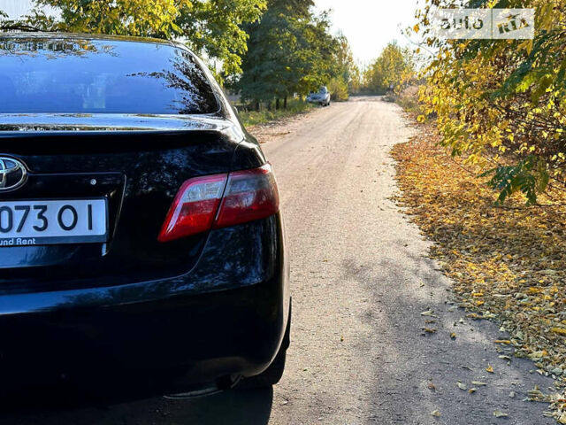 Чорний Тойота Камрі, об'ємом двигуна 2.36 л та пробігом 277 тис. км за 6500 $, фото 6 на Automoto.ua